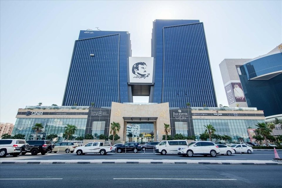 Al Shoumoukh Twin Towers on C Ring Road in Doha, photographed from street level